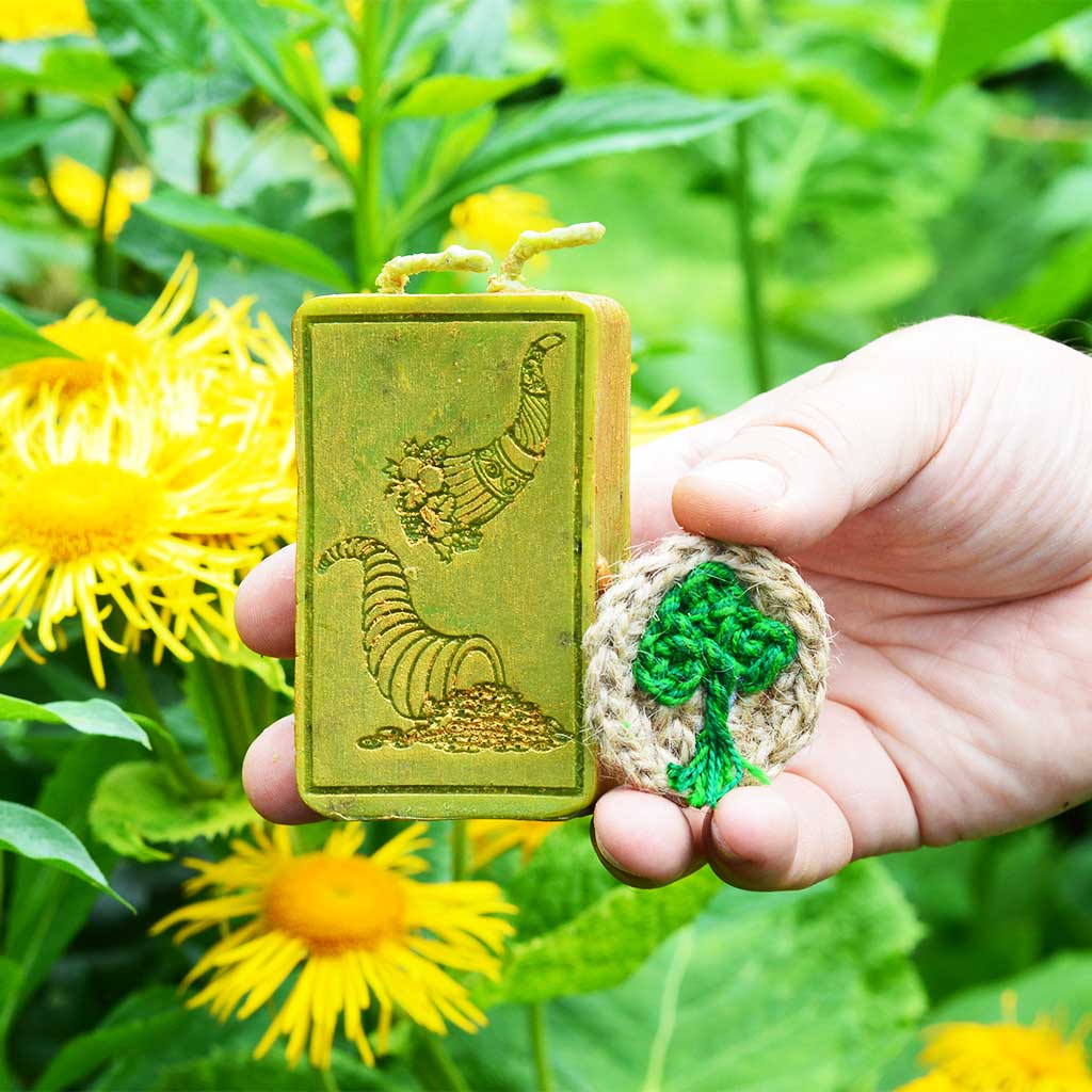 Ass der Münzen Kerze